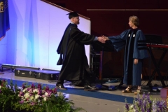 Handshake with the Dean